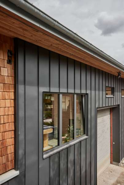 Half’n’half cladding with wood and steel, Schleusenberg 1, 23896 Panten